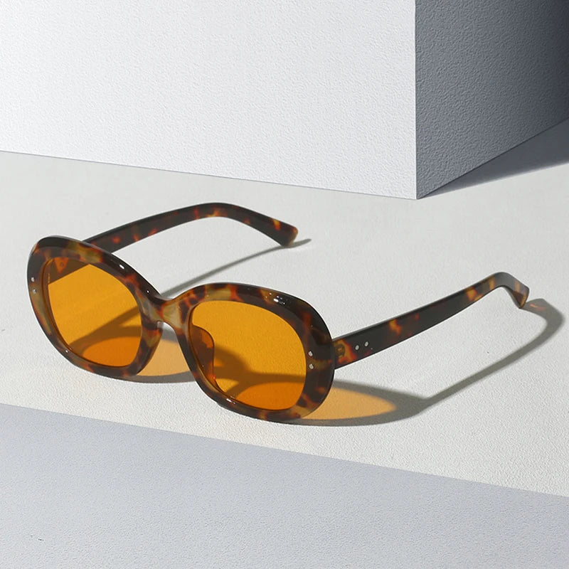 The Photini  Rivets UV Sunglasses